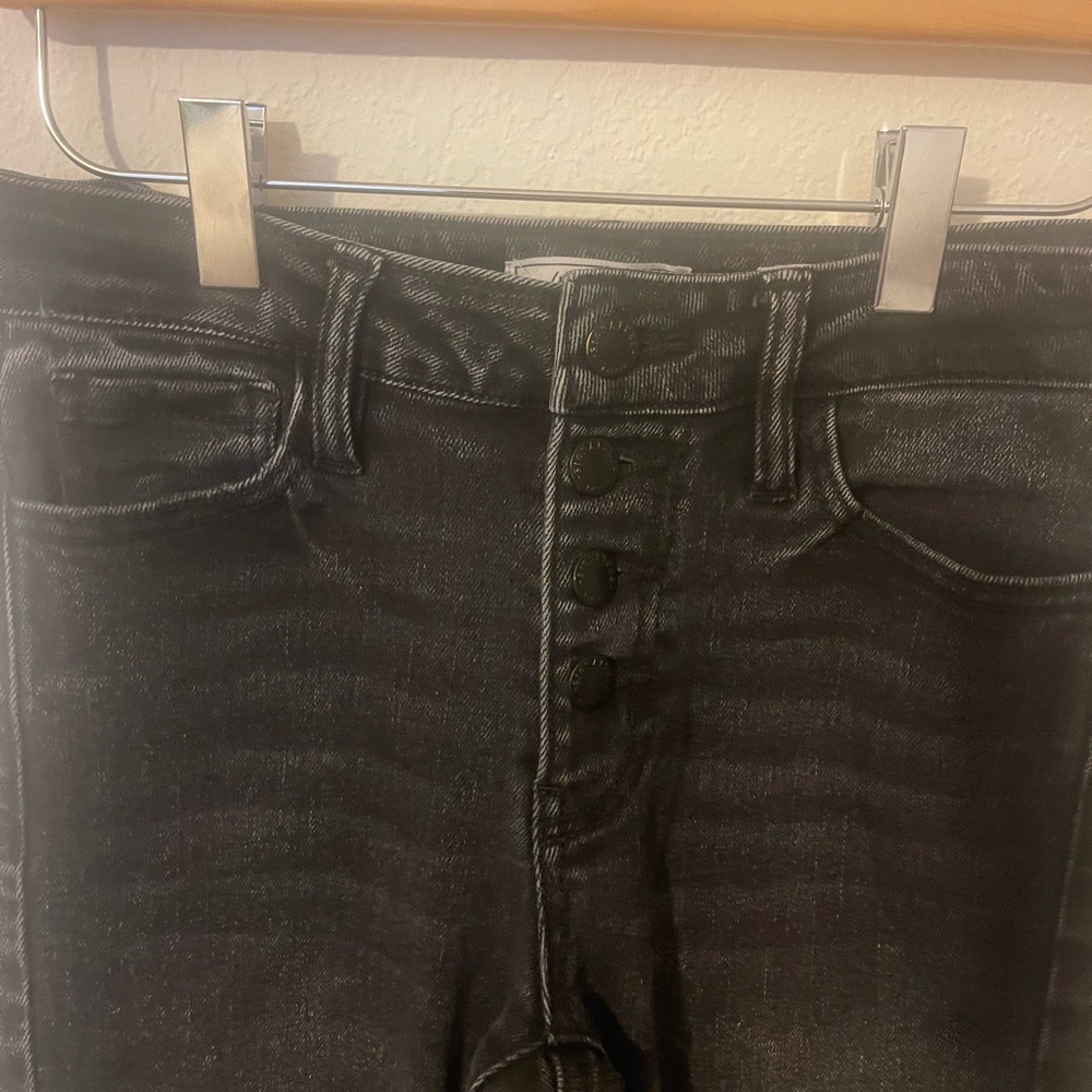 Mid rise washed black skinny jeans